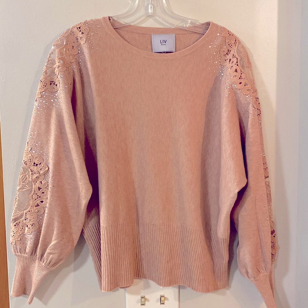 Womens summertime sweater with lace and jewel design. Size L